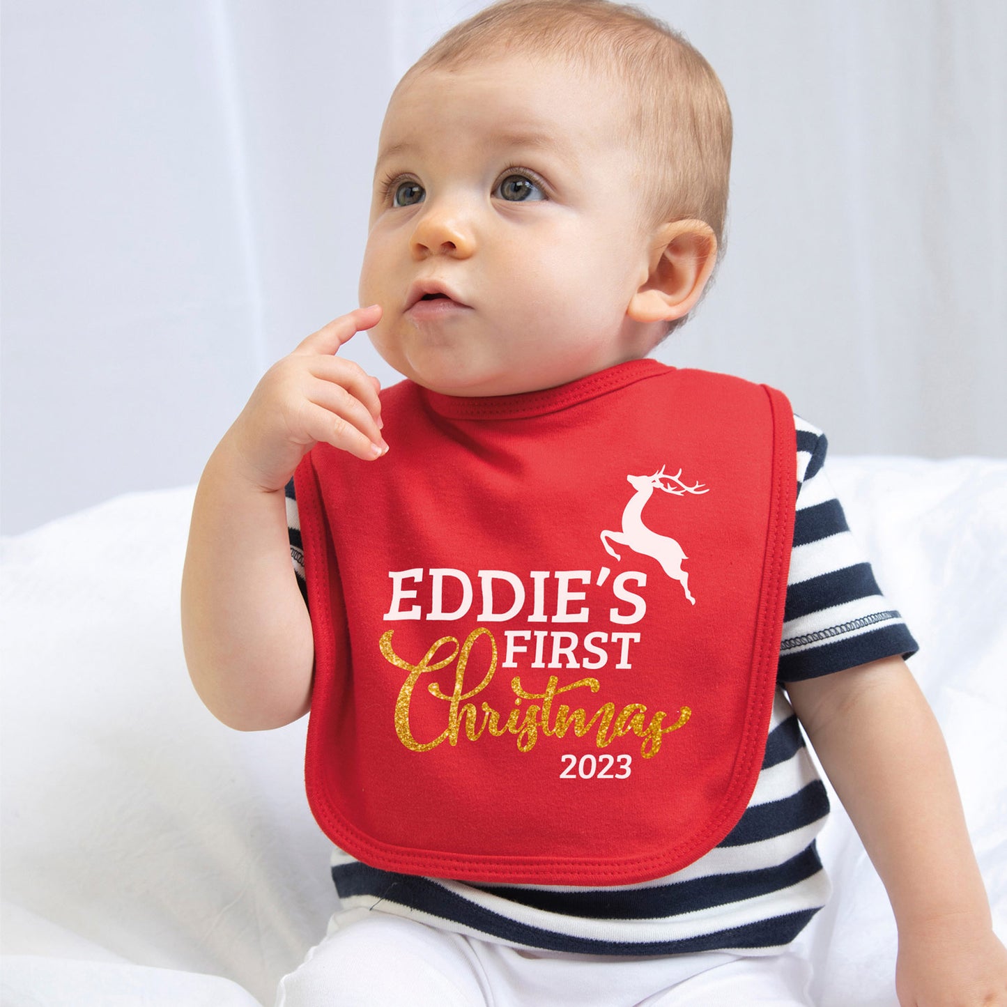 Baby's First Christmas Bib with gold glitter design