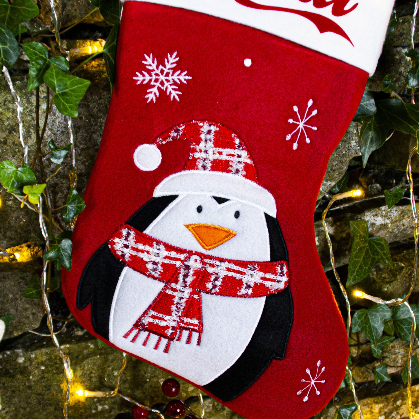 Penguin Christmas Stocking wearing a Tartan Scarf
